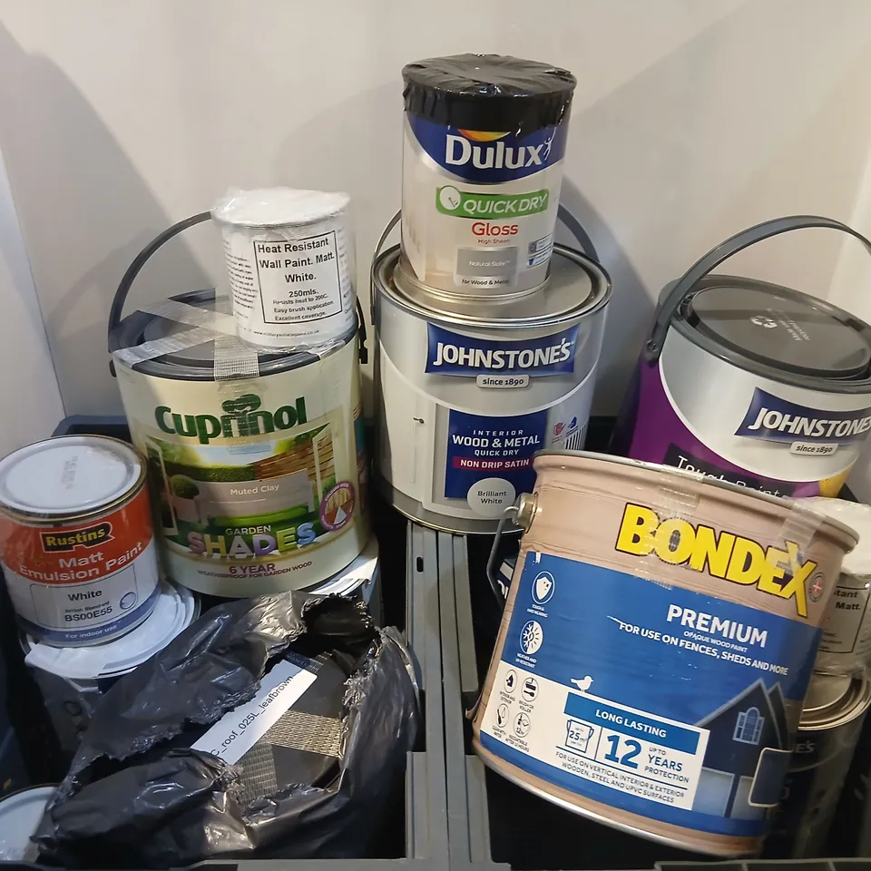 CAGE OF ASSORTED PAINT AND WOID STAIN TO INCLUDE: CUPRINOL, JOHNSTONE'S, RUSTINS, DULUX AND BONDEX