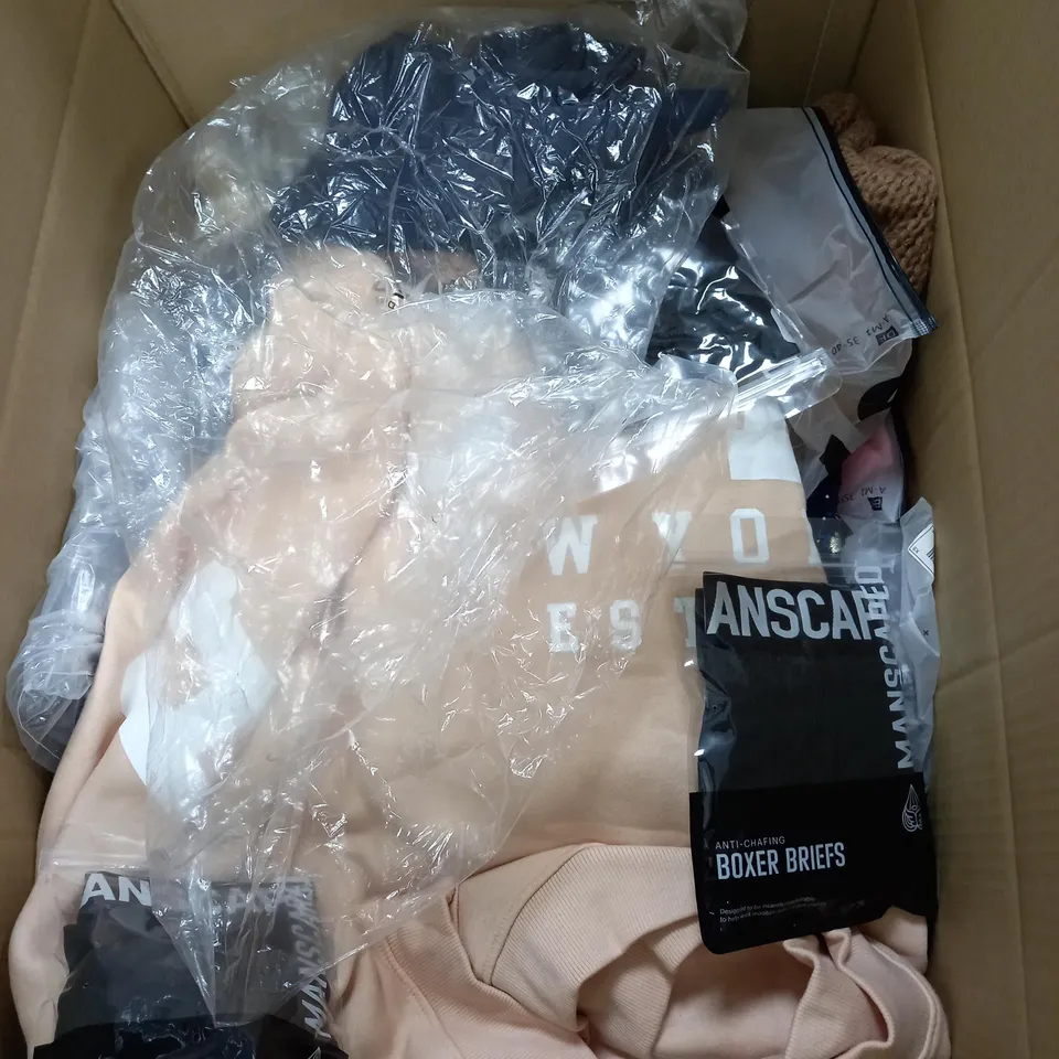 LARGE BOX OF ASSORTED CLOTHING ITEMS IN VARIOUS COLOURS AND SIZES INCLUDING TROUSERS , TOPS AND JUMPERS 