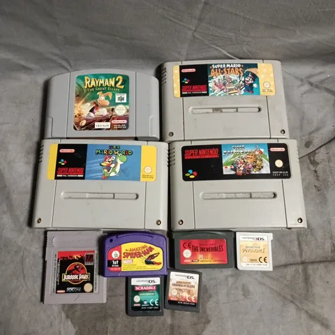 10 X ASSORTED RETRO CARTRIDGE VIDEO GAMES TO INCLUDE SUPER MARIO WORLD, SCRABBLE, JURASSIC PARK ETC 