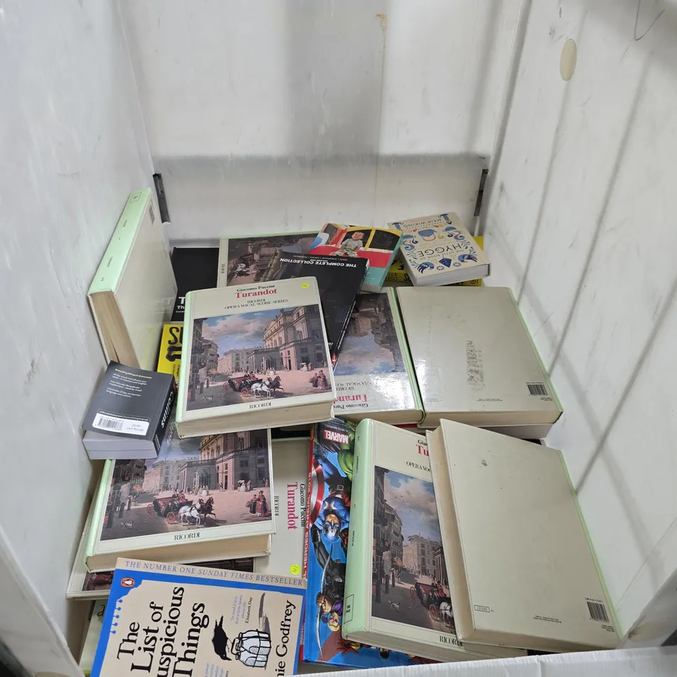 CAGE CONTAINING A LARGE QUANTITY OF ASSORTED BOOKS