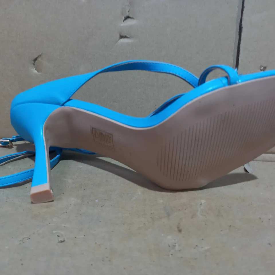 BOXED PAIR OF RAID HEELS IN BLUE UK SIZE 7