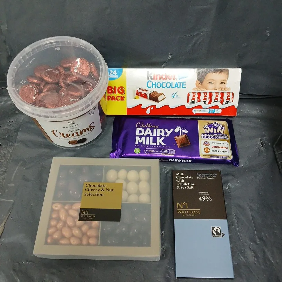 APPROXIMATELY 10 ASSORTED FOOD PRODUCTS TO INCLUDE KINDER CHOCOLATE, DAIRY MILK, COFFEE CREAMS ETC 