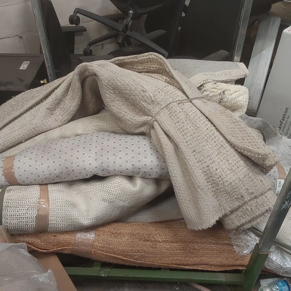 STILLAGE CONTAINING A VERY LARGE QUANTITY OF ASSORTED DESIGNER RUGS // STILLAGE NOT INCLUDED
