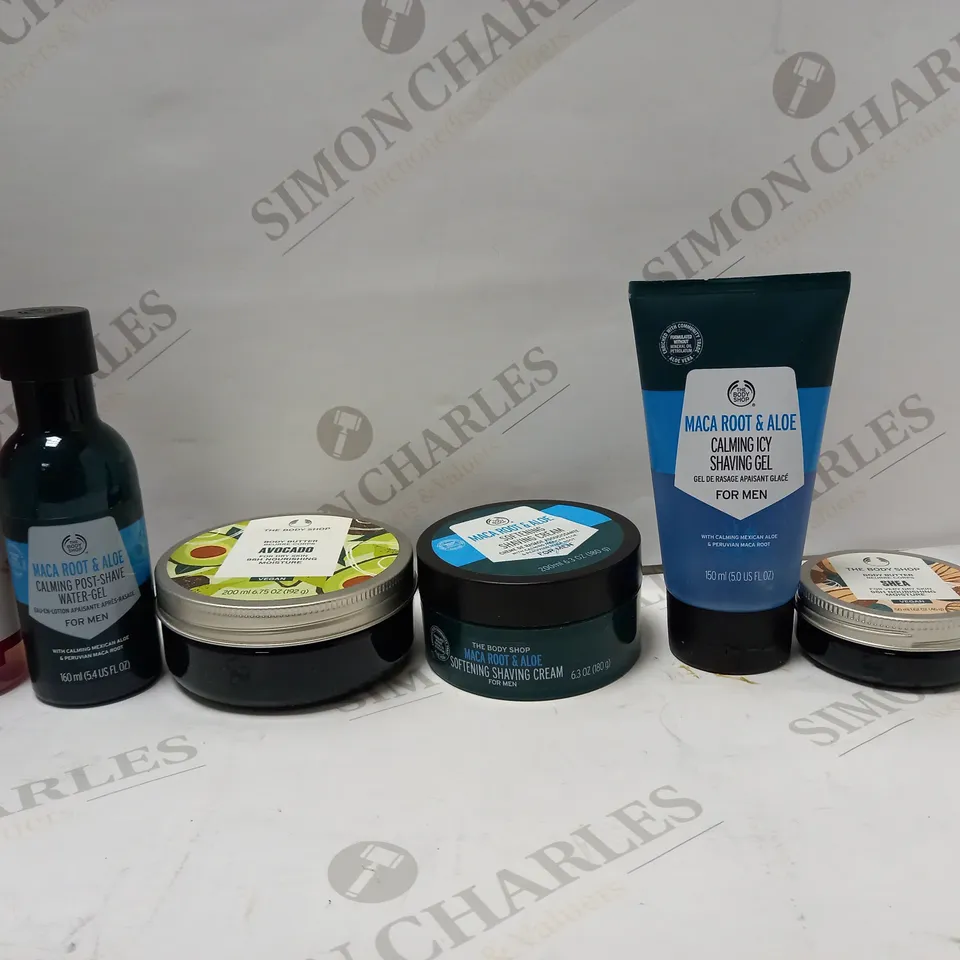 LOT OF 7 ASSORTED THE BODY SHOP PRODUCTS TO INCLUDE VITAMIN E HYDRATING TONER, AVOCADO BODY BUTTER, MENS SHAVING GEL, ETC 