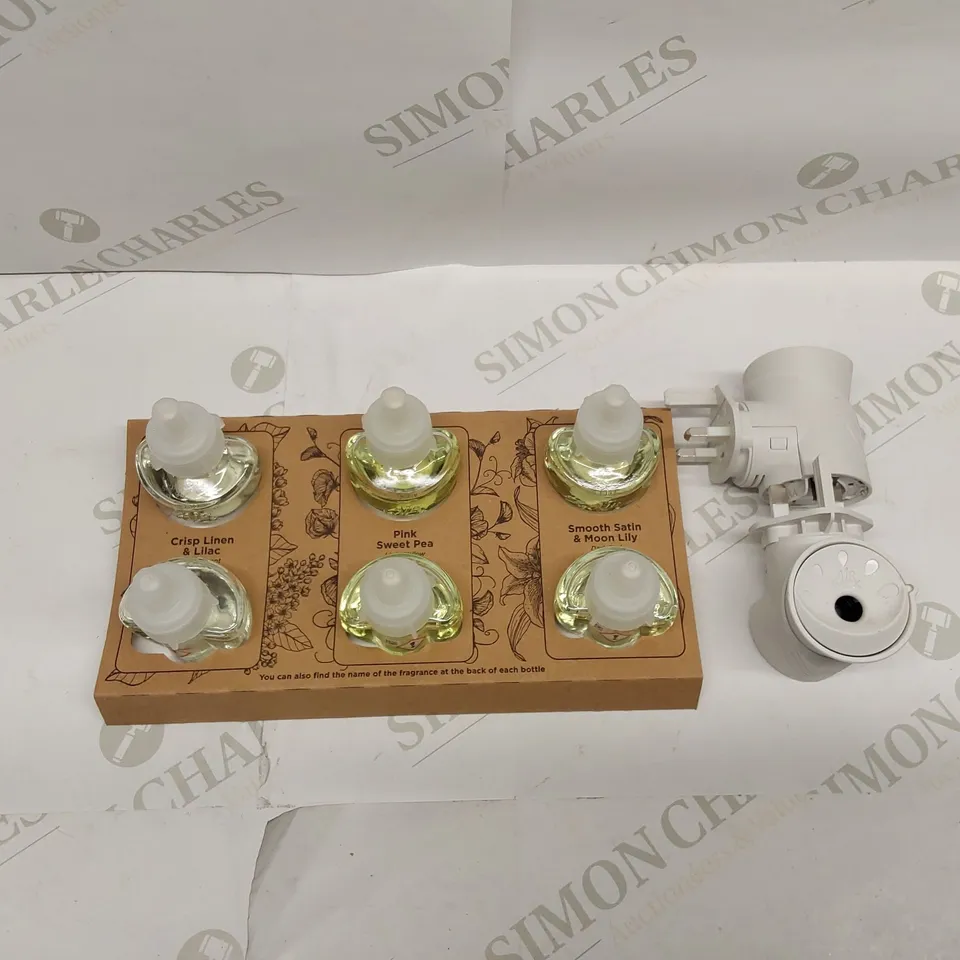 BOXED BRAND NEW AIRWICK SCENTED OILS AND ELECTRICAL PLUG DIFFUSER SET // APPROXIMATELY 2X PLUG DIFFUSERS, 6X SCENTED OIL REFILLS