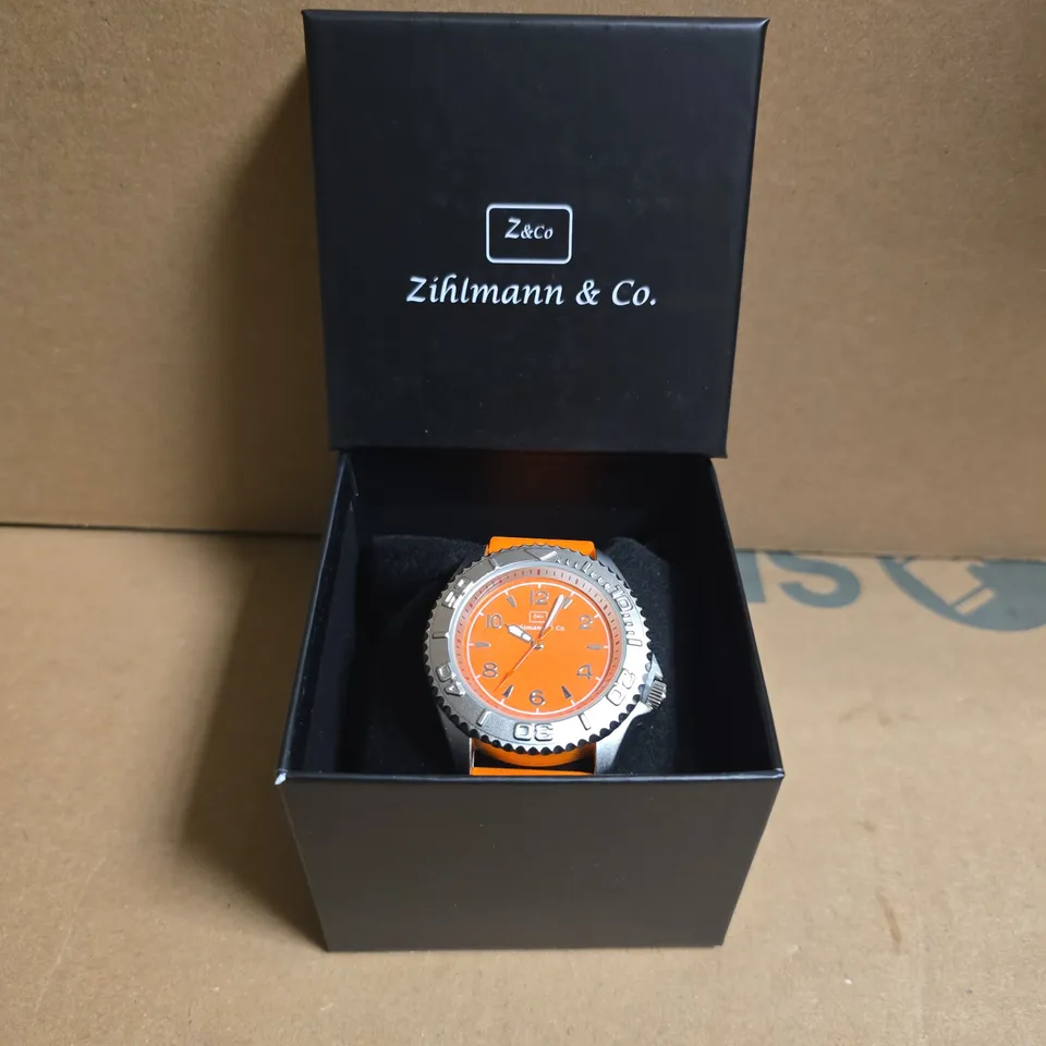 ZIHLMANN & CO STAINLESS STEEL WATCH WITH ORANGE FACE & RUBBER STRAP
