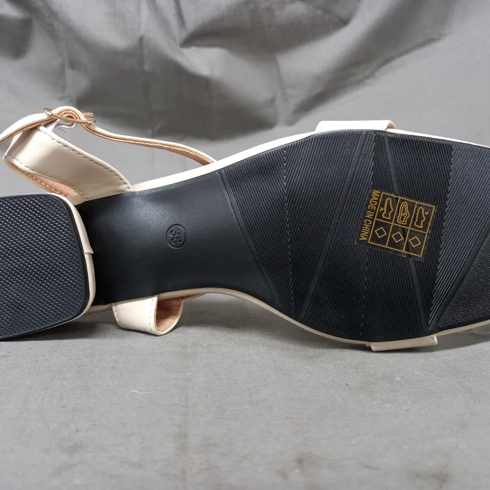 BOXED PAIR OF DESIGNER OPEN TOE LOW HEEL SANDALS IN CREAM EU SIZE 38