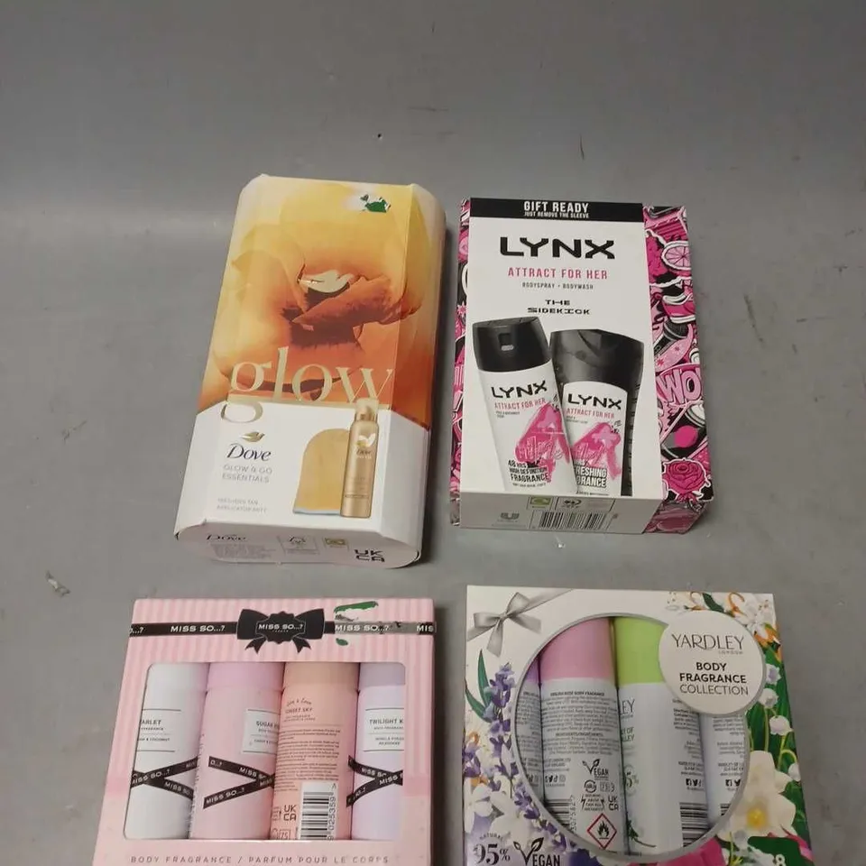 LOT OF 4 ASSORTED COSMETIC BOXSETS TO INCLUDE - DOVE GLOW & GO ESSENTIALS - LYNX ATTRACT FOR HER DUO - YARDLEY BODY FRAGRANCE COLLECTION - ETC