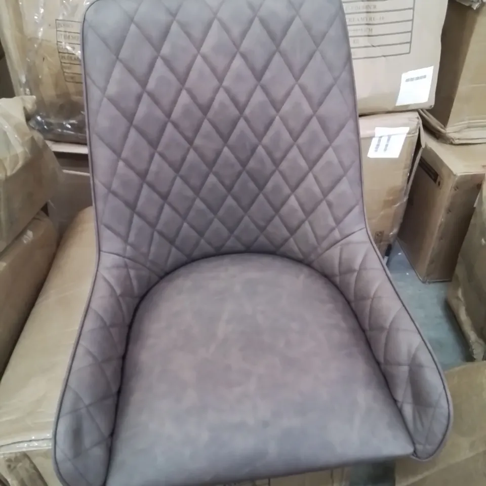 A BOXED PAIR OF BROWN HIGH BACK FAUX LEATHER UPHOLSTERED DINING CHAIRS 