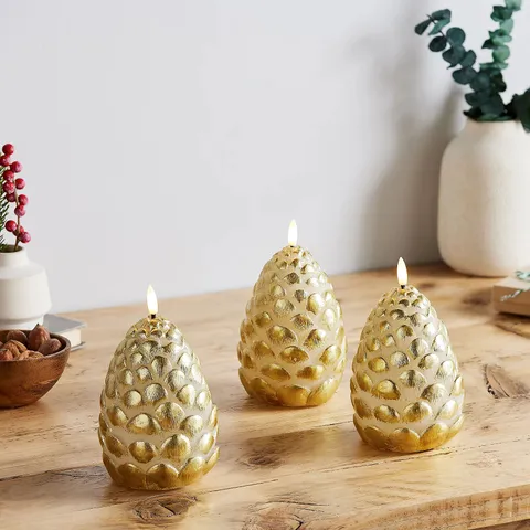 JM BY JULIEN MACDONALD SET OF 3 FLAMELESS PINE CONE WAX CANDLES