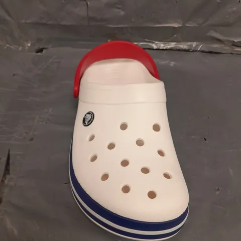 PAIR OF COCBAND CROCS IN WHITE SIZE 4