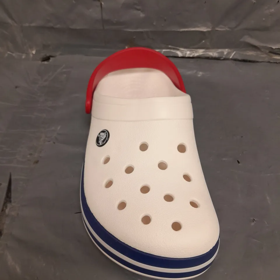 PAIR OF COCBAND CROCS IN WHITE SIZE 4