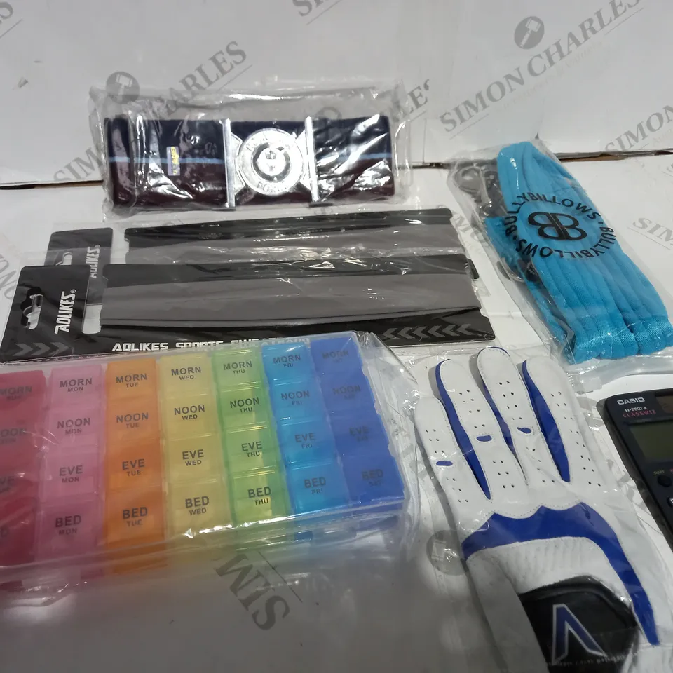 BOX OF ASSORTED ITEMS APPROXIMATELY 20 TO INCLUDE ROYAL AIR FORCE BELT, PILL BOX FOR MEDICATION, SPORT SWEAT BANDS ETC