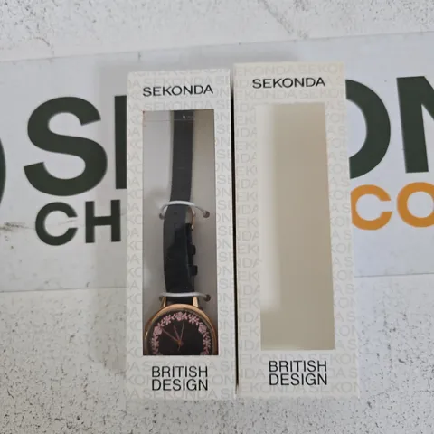 SEKONDA BRITISH DESIGN LADIES' WATCH – BLACK STRAP WITH PINK FLORAL DIAL, BOXED 