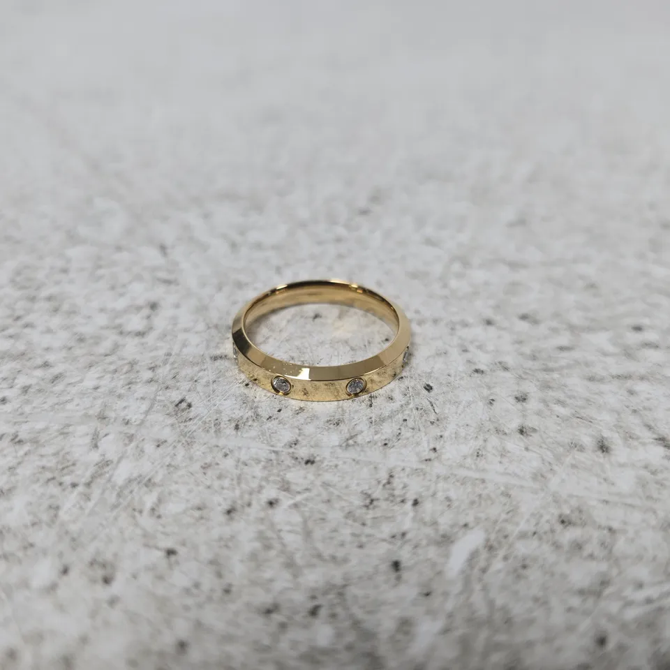 DANIEL WELLINGTON YELLOW GOLD RING WITH SMALL STONES