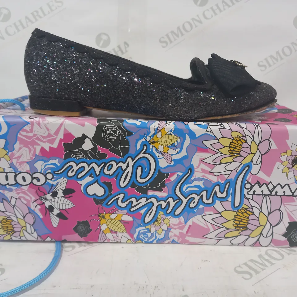 BOXED PAIR OF IRREGULAR CHOICE LOW HEEL SLIP ON SHOES IN BLACK/MULTICOLOUR W. SEQUINS & BOW DETAIL SIZE UNSPECIFIED