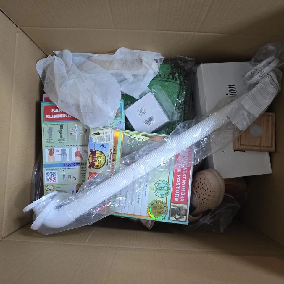 APPROXIMATELY 15 ASSORTED ITEMS TO INCLUDE SANKOM SUPPORT BRA, DR LIGHTFOOT SHOES, POLYRESN LADIES HEAD PLANTER, ETC - COLLECTION ONLY