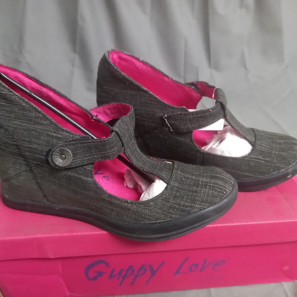 BOX OF APPROXIMATELY 10 BLACK  GUPPY LOVE BY BLOWFISH SHOES IN VARIOUS SIZES 