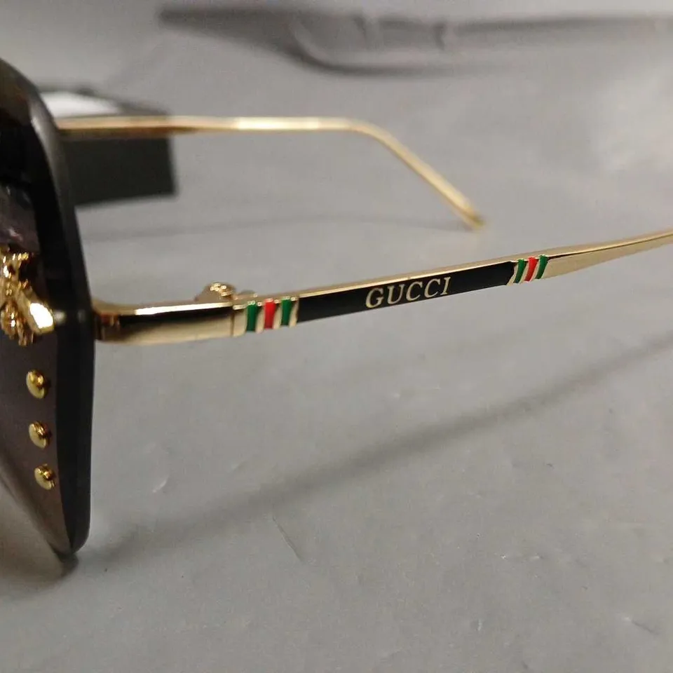 BOXED PAIR OF GUCCI GLASSES