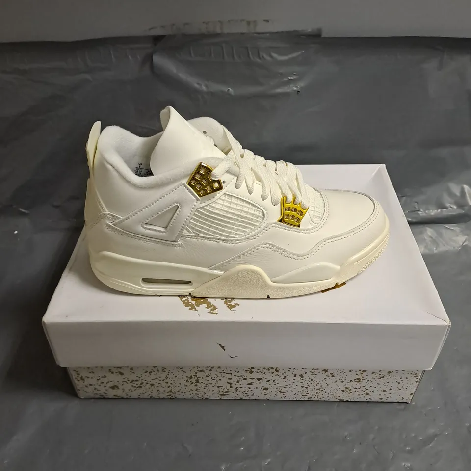 BOXED PAIR OF JORDAN 4 RETRO IN METALLIC GOLD/WHITE SIZE WOMENS UK 5.5