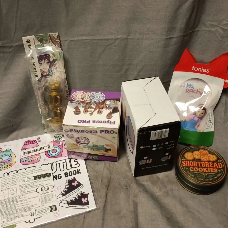 APPROXIMATELY 12 ASSORTED TOYS & GAMES PRODUCTS TO INCLUDE FLYNOVA PRO, KARAOKE SYSTEM, TONIES MS. RACHEL TOY, ETC