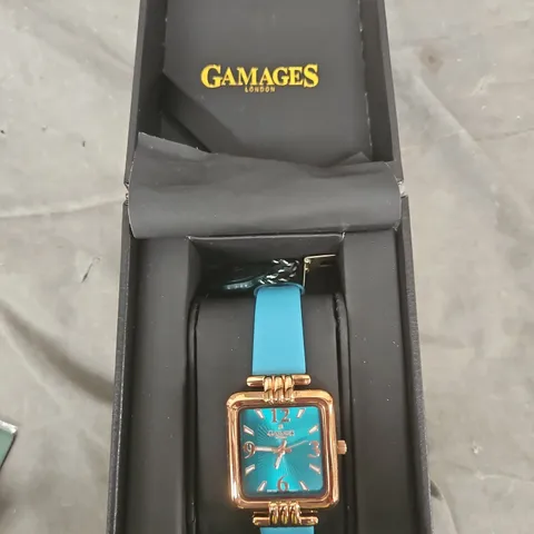 GAMAGES LONDON WRISTWATCH WITH BLUE STRAP – ROSE-GOLD SQUARE CASE 