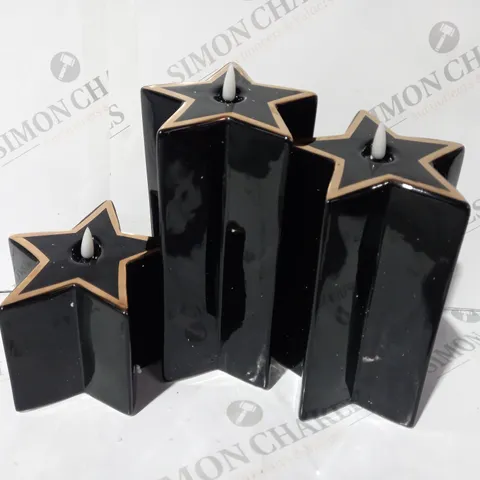 HOME REFLECTIONS PORCELAIN STAR PRE-LIT CANDLES SET OF 3 - BLACK