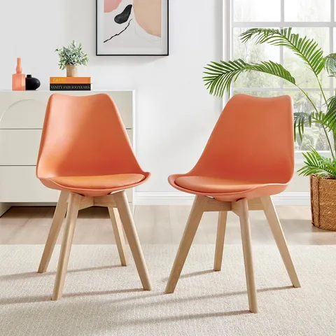 BOXED SET OF 2 STOCKHOLM SCANDI ORANGE FAUX LEATHER AND WOOD DINING CHAIRS (1 BOX)