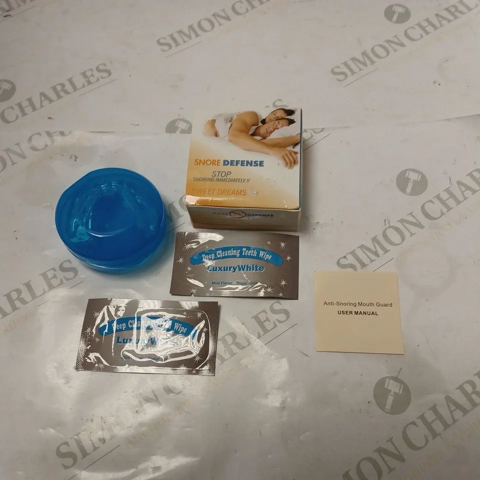 BOXED SNORE DEFENSE MOUTHGUARD WITH TEETH WIPES AND INSTRUCTIONS