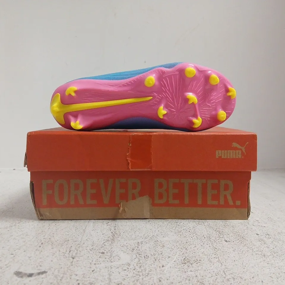 BOXED PAIR OF PUMA JUNIOR ULTRA 6 MATCH FIRM GROUND FOOTBALL BOOTS IN PINK/BLUE/ORANGE SIZE UK 1