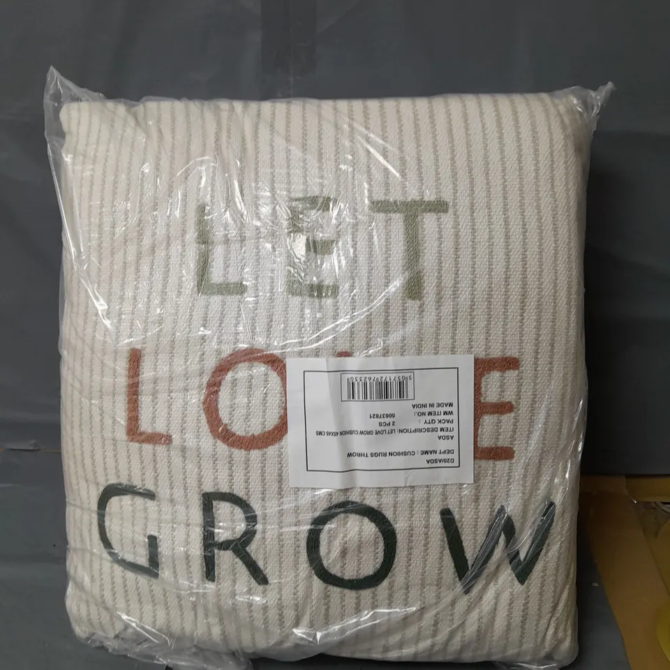 APPROXIMATELY 12 DEEP FILLED LET LOVE GROW CUSHIONS