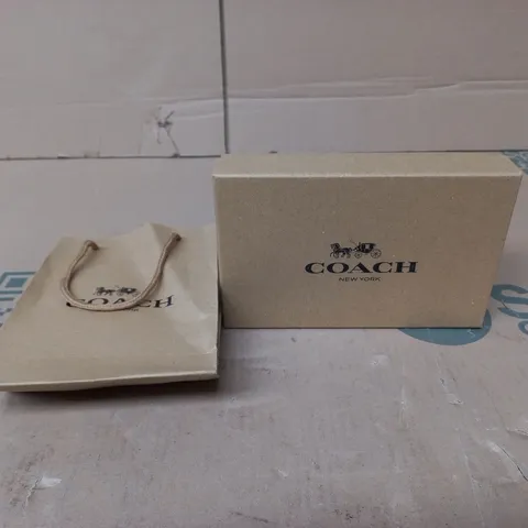 COACH BELT IN BRANDED BOX AND BAG