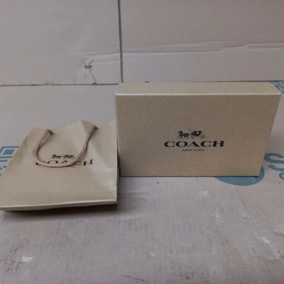 COACH BELT IN BRANDED BOX AND BAG