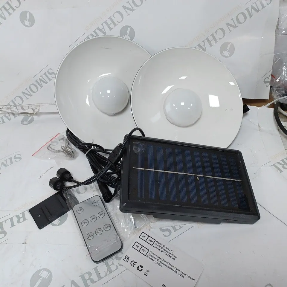 TWO SOLAR POWERED LIGHTS AND REMOTE