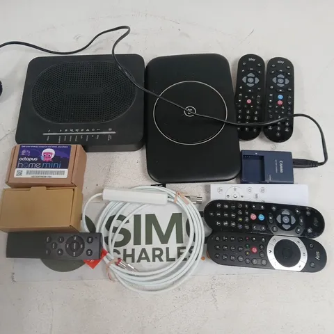 LOT OF ASSORTED HOUSEHOLD ITEMS TO INCLUDE ROUTERS, REMOTES AND CABLES