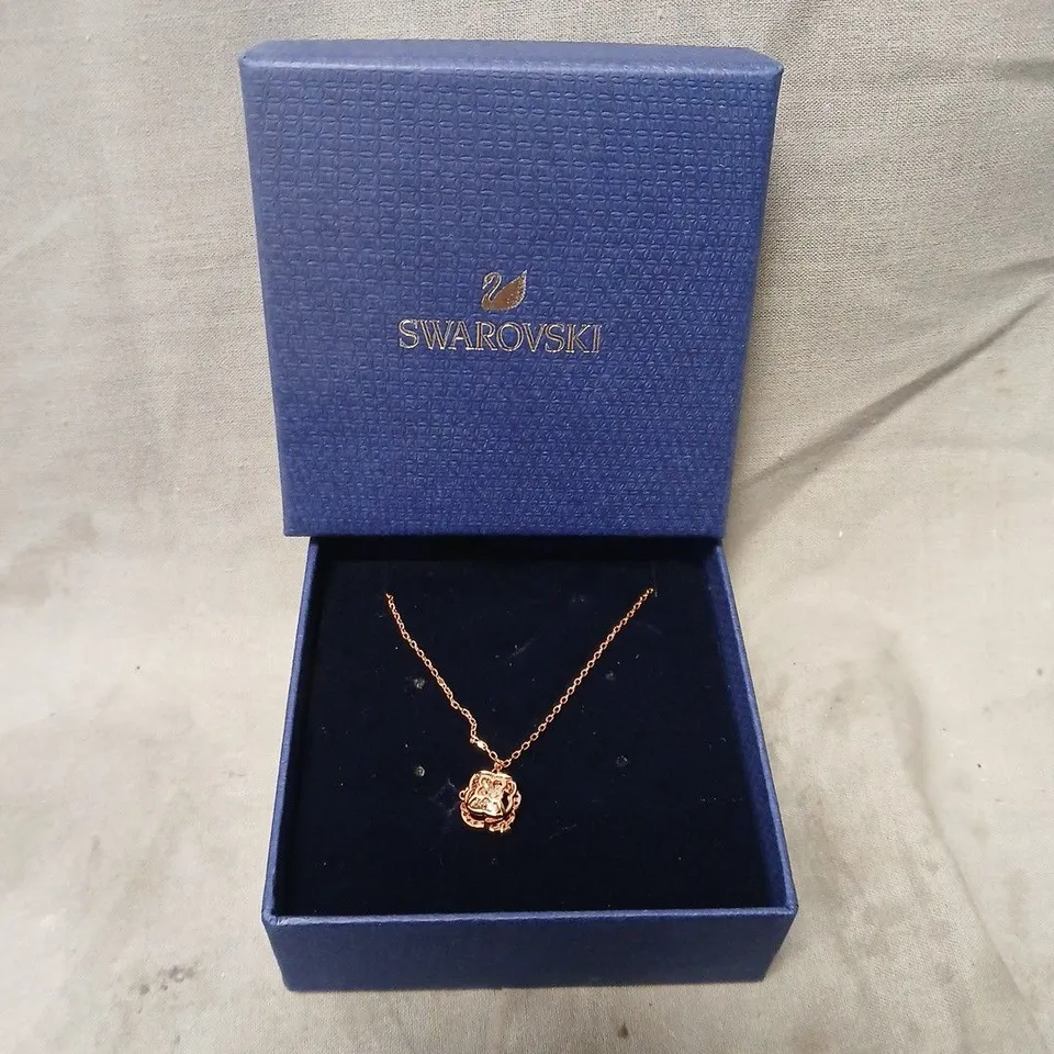 SWAROVSKI ROSE GOLD TONE NECKLACE WITH FLORAL PENDANT – BOXED