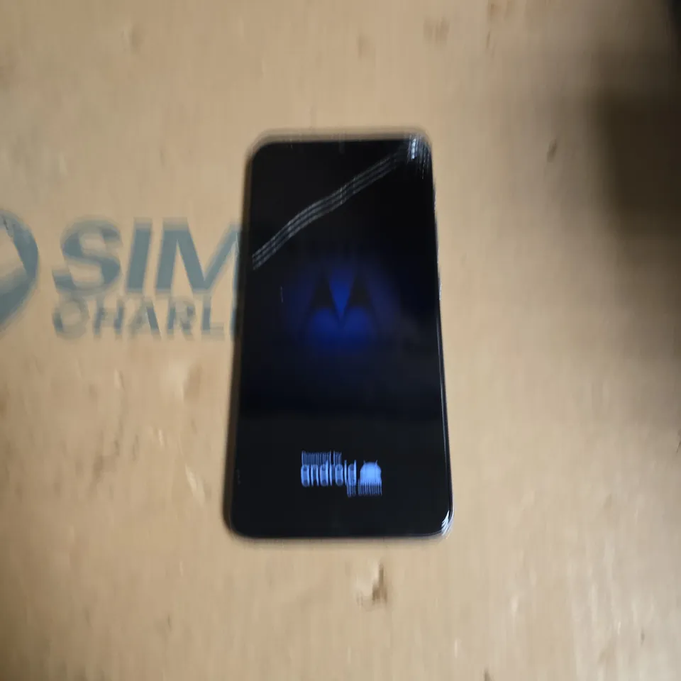MOTOROLA SMARTPHONE - BLACK, TRIPLE REAR CAMERA, HEXAGONAL BACK PATTERN 