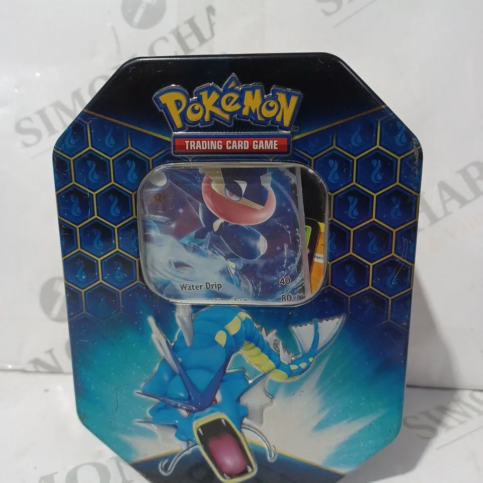 POKÉMON TRADING CARD GAME TIN OF ASSORTED CARDS