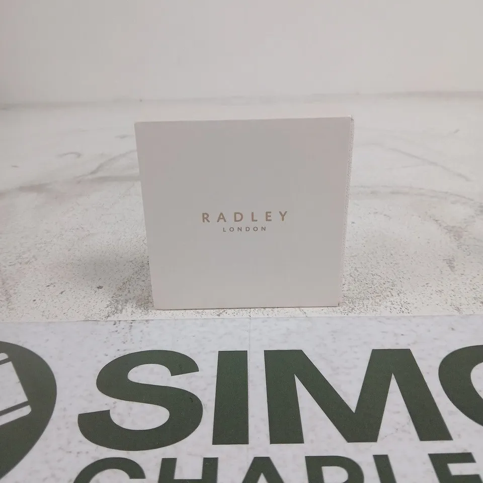 RADLEY LONDON GOLD FLOWER BRACELET IN BOX