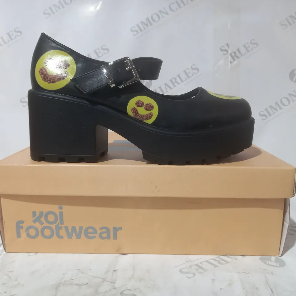 BRAND NEW BOXED PAIR OF KOI VEGAN LEATHER TIRA MARY JANES SPILL THE BEANS EDITION SHOES IN BLACK/BEAN SMILEY UK SIZE 4