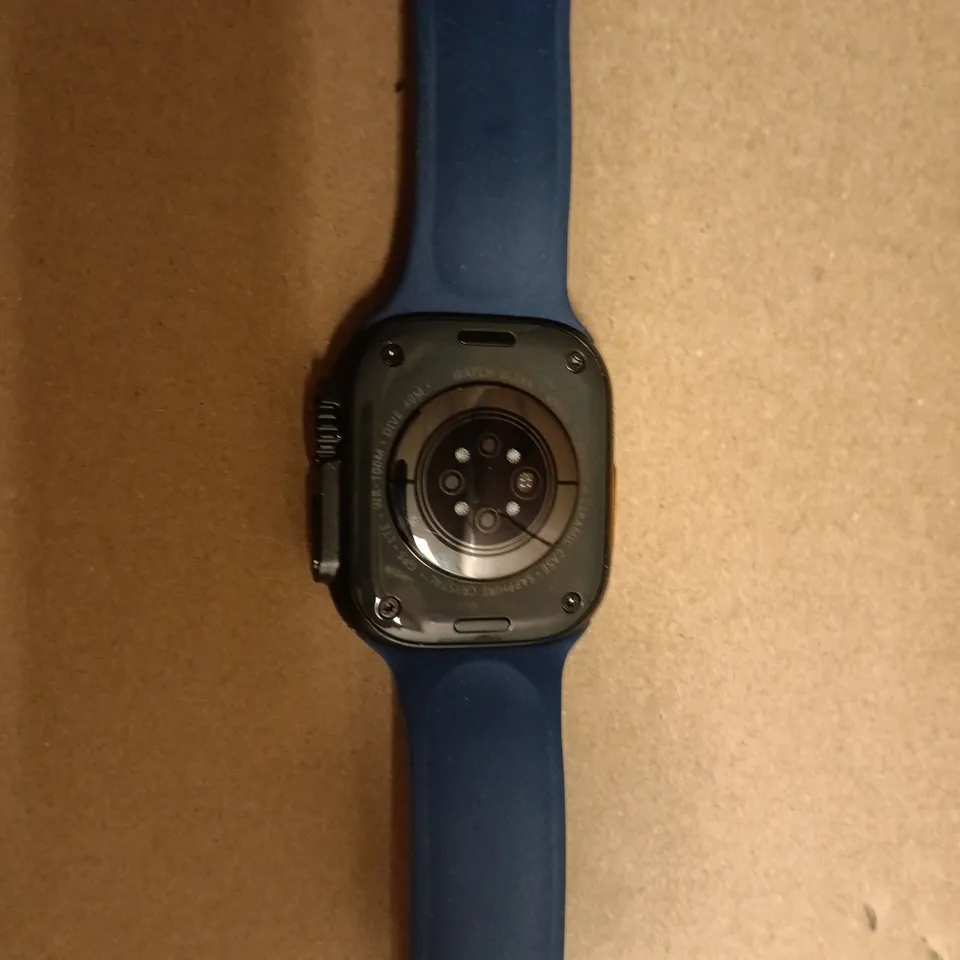 APPLE WATCH ULTRA WITH BLUE SILICONE STRAP