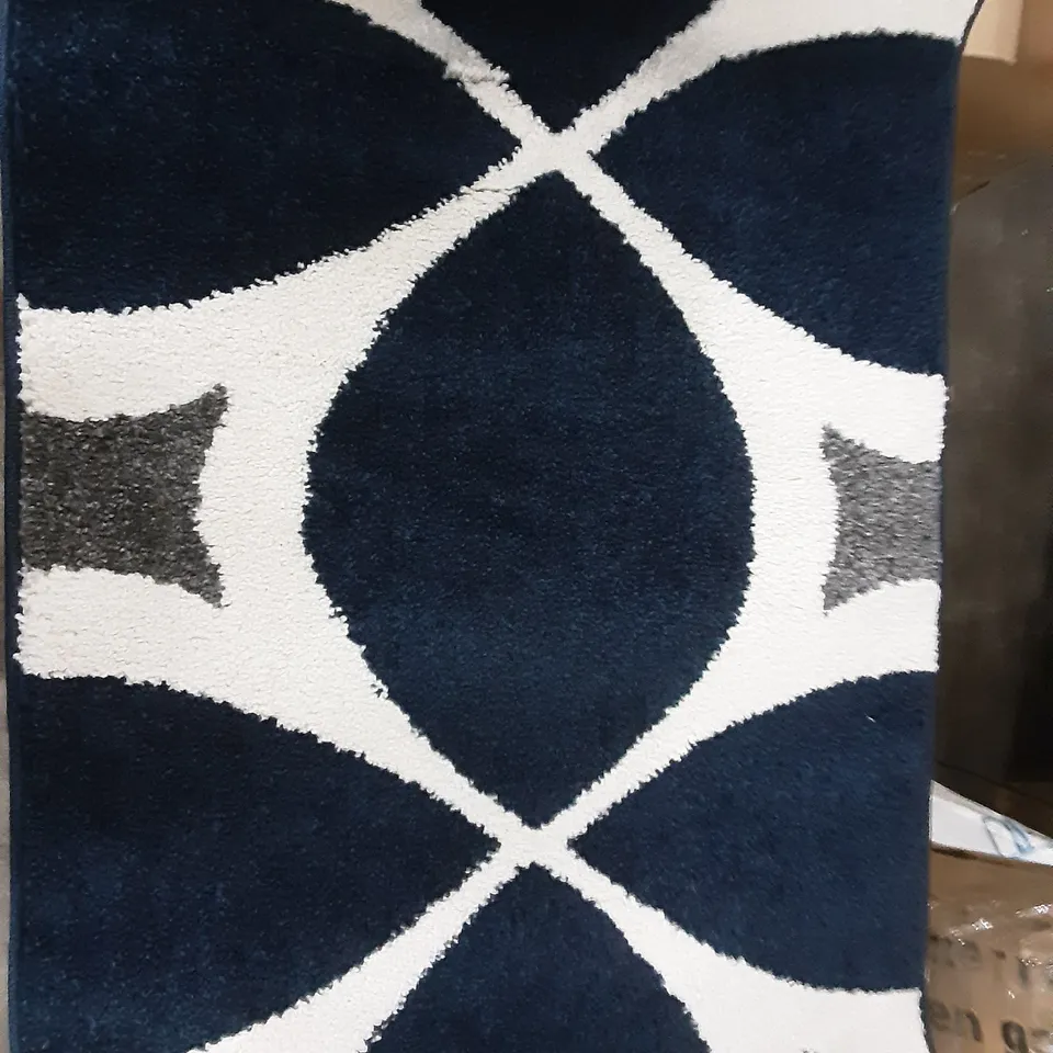 BOXED NAVY RUG ,  2' X 3'