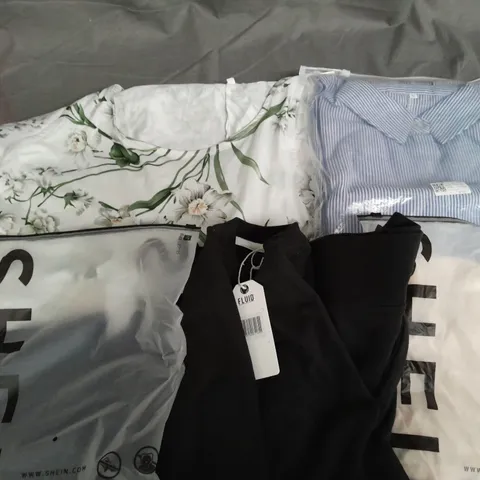 APPROXIMATELY 50 ASSORTED CLOTHING ITEMS TO INCLUDE - SHIRT, SWEATER, DRESS ETC.