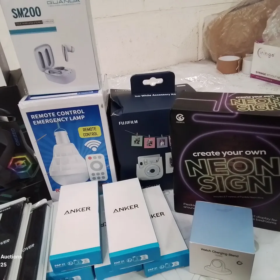 BOX CONTAINING LARGE AMOUNT OF BOXED ELECTRICAL ITEMS TO INCLUDE: HEADPHONES, INSTAX ACCESSORIES KITS, NEON SIGN, PHONE CASES , CHARGING CABLES AND LOTS MORE