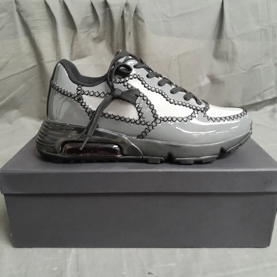 BOXED PAIR OF FLAWSY ONE GREY TRAINERS SIZE UK9