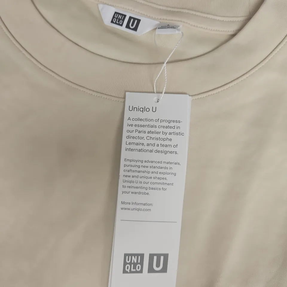 UNIQLO TEE IN PALE YELLOW - LARGE
