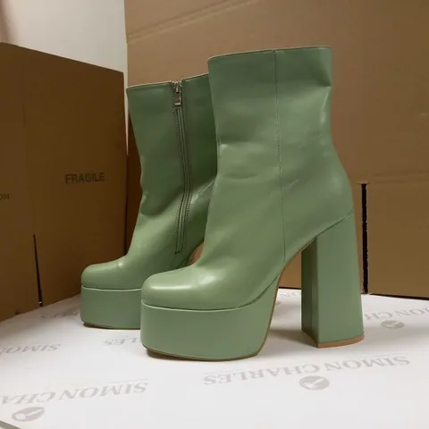 KOI SAGE PLATFORM HEELED ANKLE VEGAN BOOTS - SIZE 7