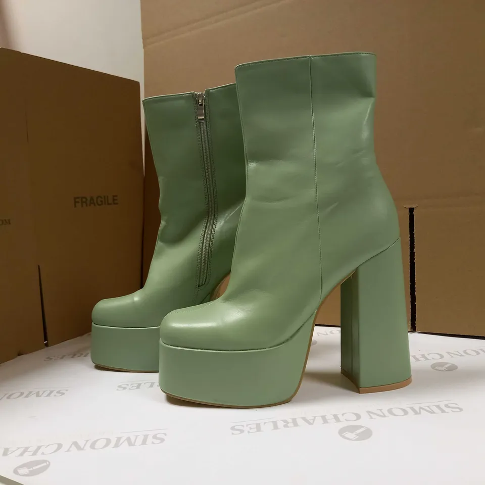 KOI SAGE PLATFORM HEELED ANKLE VEGAN BOOTS - SIZE 7