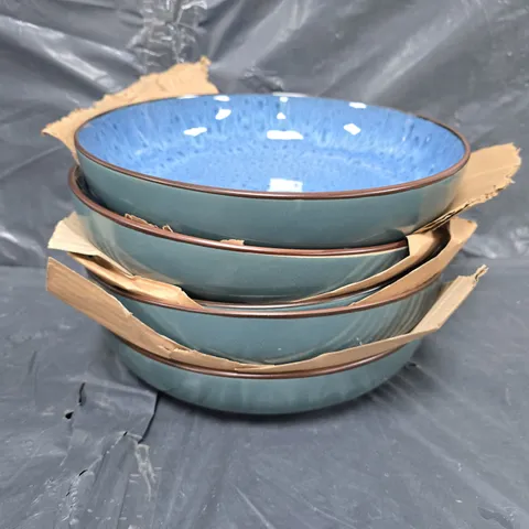 4 glazed serving bowls in blue 