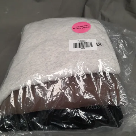 SEALED SET OF 3 HOLLISTER JOGGERS IN VARIOUS COLOURS TO INCLUDE - GREY , BROWN , BLACK - MEDIUM